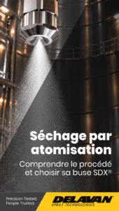 Buse de pulvérisation industrielle Delavan projetant un brouillard fin dans une tour de séchage par atomisation
